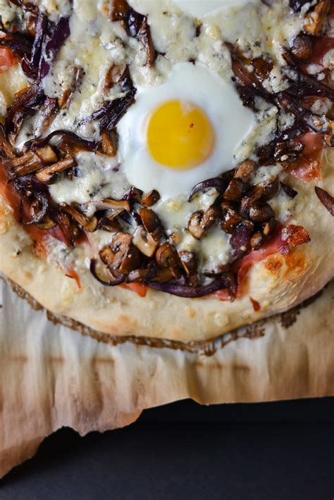 Prosciutto Caramelized Onion Mushroom And Gorgonzola Pizza With An