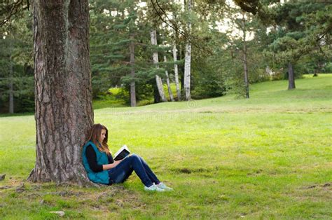 Beautiful Girl Sitting Under Oak Tree Reading Book Spring Stock Photos