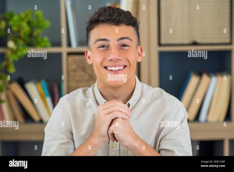 Portrait Of One Young And Happy Cheerful Man Smiling Looking At The