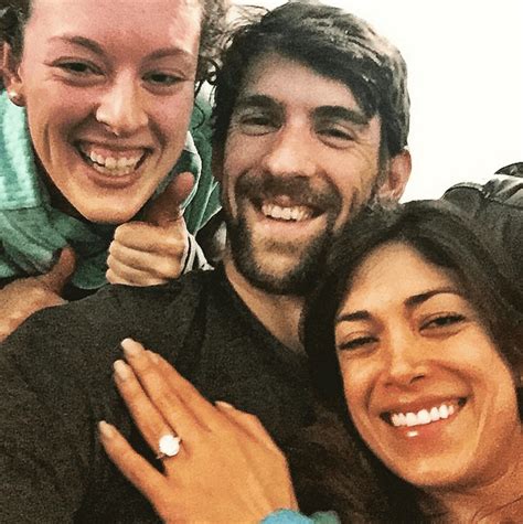 she said yes michael phelps gets engaged to girlfriend nicole johnson
