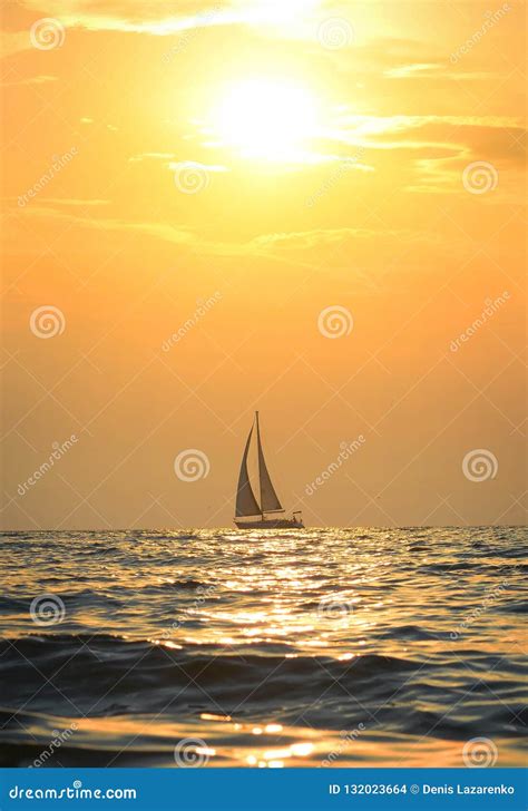 Seascape With Sailboat In Summer At Sunset Stock Photo Image Of