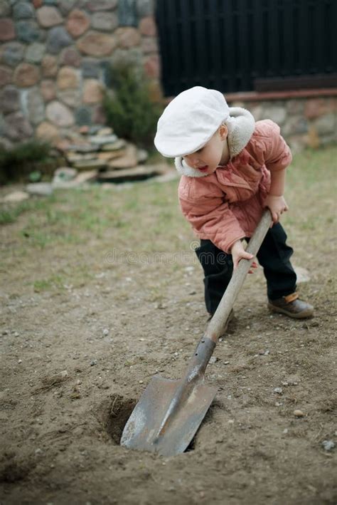 Little Boy Digging A Hole Stock Photo Image Of Outside 58070562
