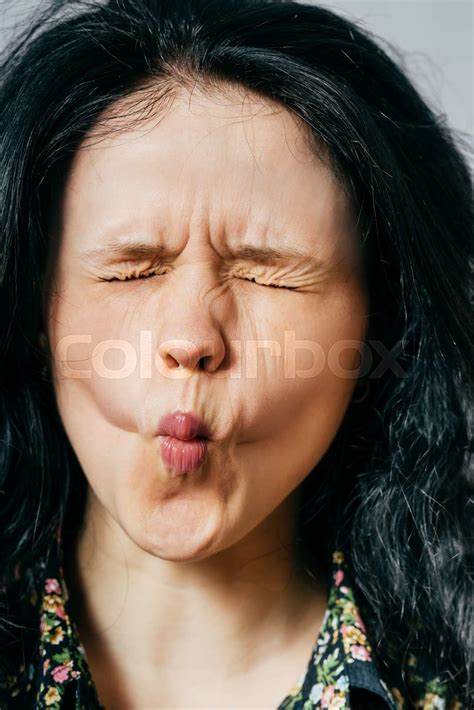 Headshot Portrait Of Beautiful Women Sucking In Cheeks Stock Image Colourbox