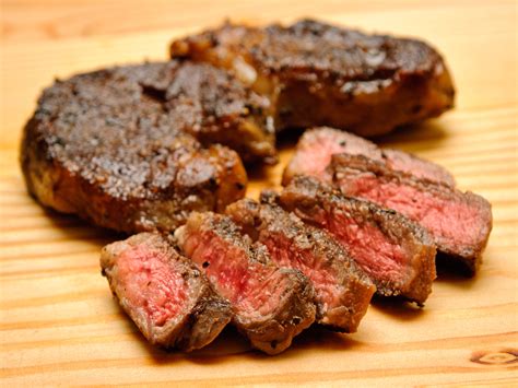 Letting the meat come to room temperature before it hits the pan and rest when it's done allows the steak to cook evenly. 3 Ways to Cook Steaks in the Oven - wikiHow