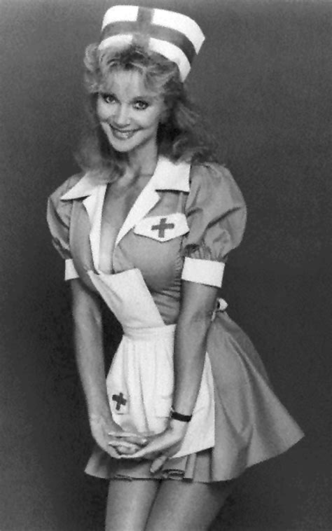 A Black And White Photo Of A Woman In Sailor Costume