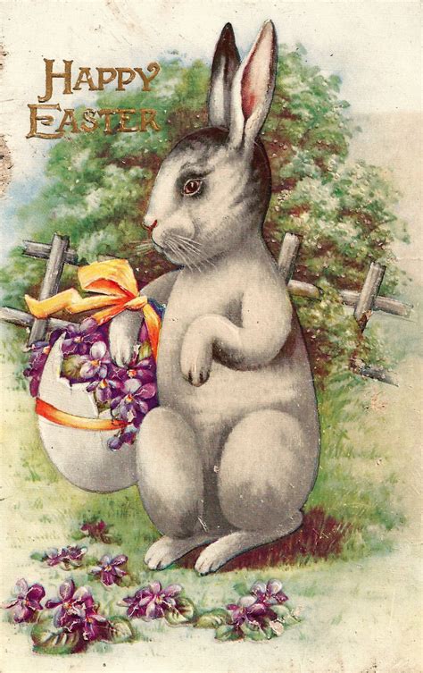 antique images free easter clip art vintage easter bunny carrying egg basket on postcard