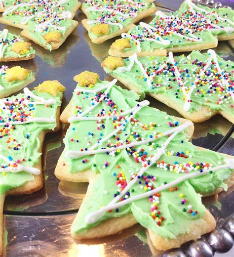 Gather up everyone's favorite red and green treats and let them go to town. Christmas Sugar Cookies - Through Her Looking Glass