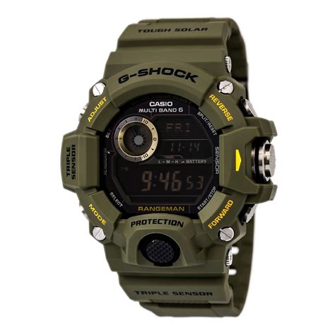 Green resin band digital watch with black face, orange accents on the dial and the side button. G-Shock Rangeman Reviews