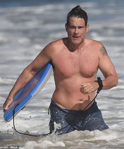 rob lowe 56 goes shirtless while surfing in santa barbara hot lifestyle news