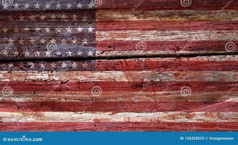 Weathered Grunge Usa Flag On An Old Wooden Wall Background Stock Image