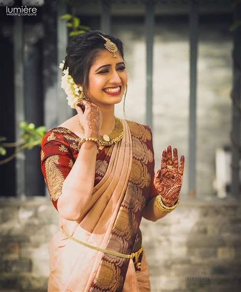 this south indian bride in a simplistic saree minimal jewellery and her natural be… indian