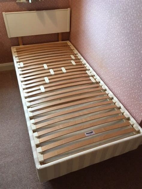 They can also sometimes come with mattress pads or separate legs. Dunlopillo sprung timber slatted divan single bed base ...