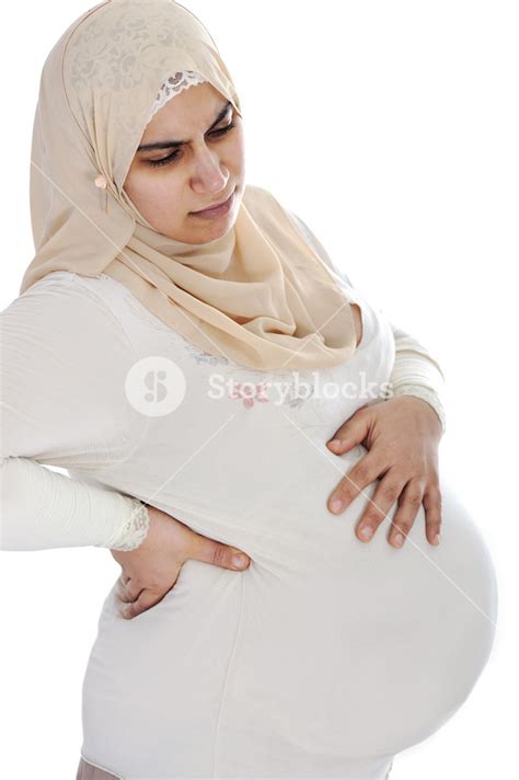 Muslim Arabic Pregnant Woman With Pain In Back Royalty Free Stock Image
