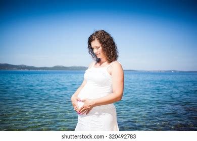 Pregnant Woman On Beach Stock Photo 320492783 Shutterstock