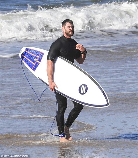 Chris Hemsworth Showcases Godlike Muscles After Surfing Daily Mail Online