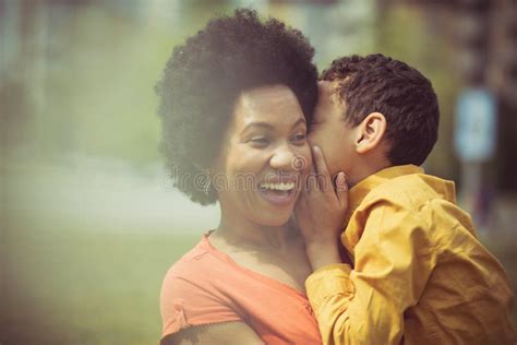 The Secret Language Only A Mom And Son Will Understand Stock Photo