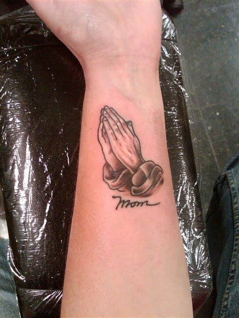 Tattoo with cross on chest: Praying Hands Tattoos for Men - Ideas and Designs for Guys