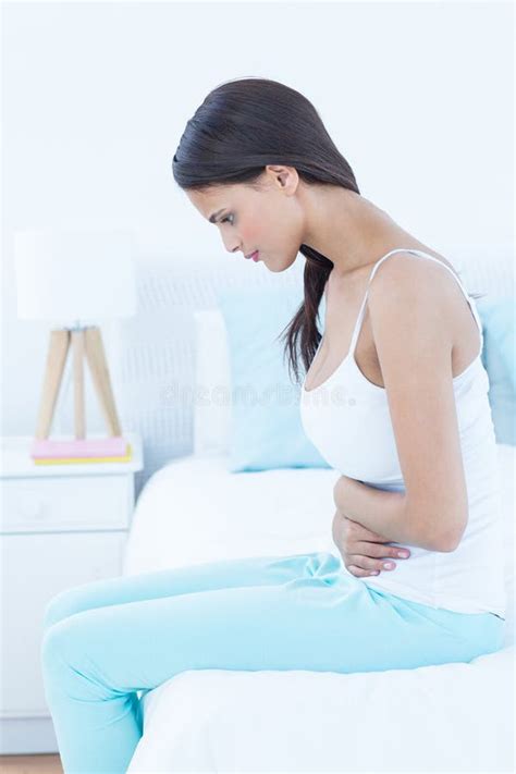 Pretty Woman Suffering From Stomach Pain Stock Image Image Of Bedroom