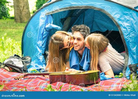 Group Of Best Friends Having Fun Camping Together Outdoors Stock Image Image Of Middle Kiss