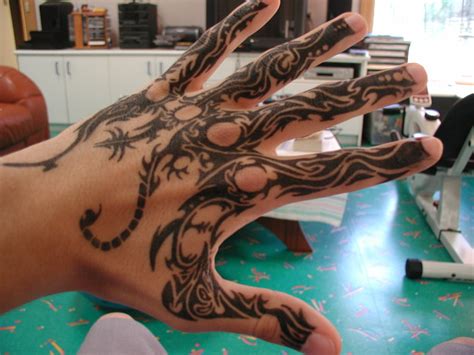 A List Of Best Hand Tattoo Designs Tutorialchip
