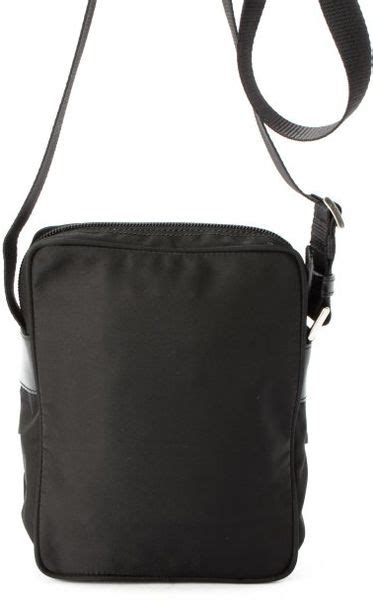 I don't think i've heard any particularly bad reviews. Prada Black Nylon Pocket Detail Crossbody Bag in Black | Lyst