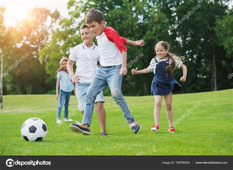 Children Playing Soccer — Stock Photo © Alebloshka 159790554