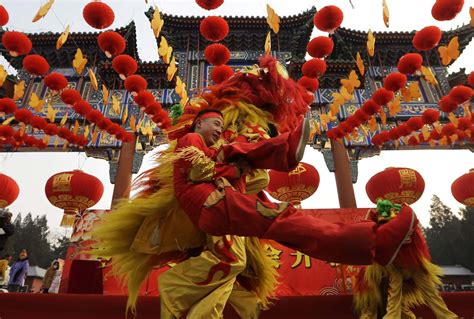 Chinese Artists Perform The Lion Dance During The Opening Ceremony Of