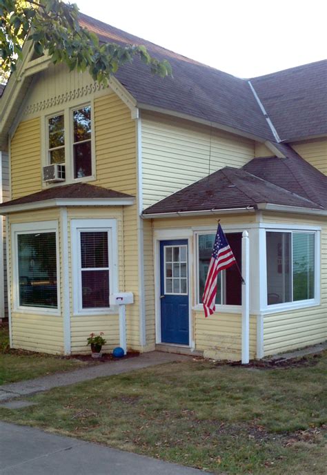 Your front door can transform the exterior of your house, so choosing what colour to paint it, is a big decision. Blue Door, Yellow House | Yellow house front door, Yellow ...