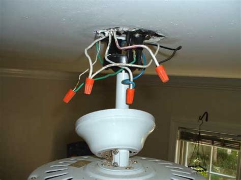 When installing this ceiling fan support you first insert the bar hanger through and old outlet box hole in the ceiling drywall then rotate the square tube 1. We hung a headboard and two new ceiling fans - Reeder ...
