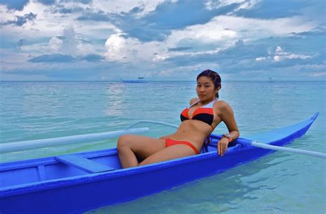 Girl Wearing A Bikini Sitting In A Small Banca Boat Boracay Hotels