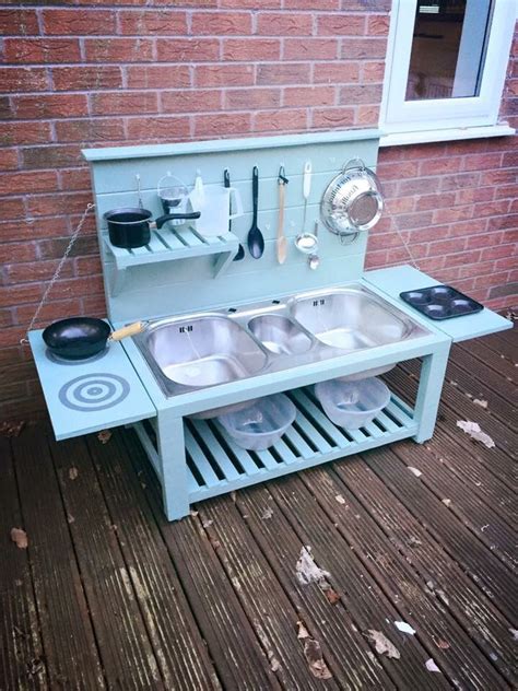 For an easy start to make a play kitchen, find an old entertainment center someone could not sell or sold for very cheap. Mommy Monday: Five Cheap DIYs that will make your backyard ...