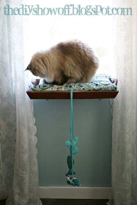 This is a cat window perch and a space saving cat bed. DIY - How to Make a Cat Window Perch | Cat window perch ...