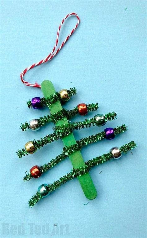 pin van annemarie van jole berndsen op kerstmis stokjes knutselen kerst knutselen ornament