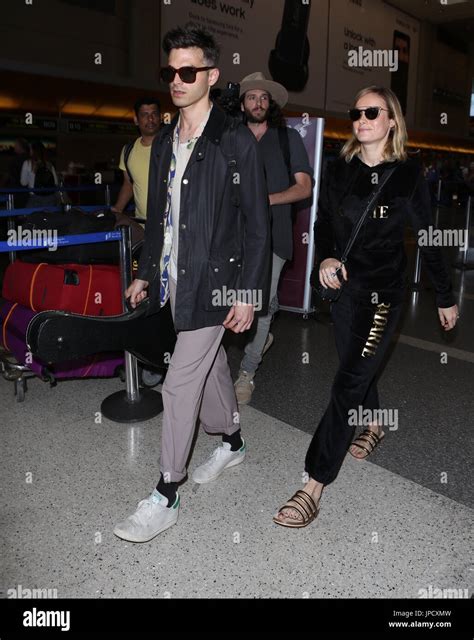 Brie Larson and her fiancé Alex Greenwald depart from Los Angeles International LAX Airport