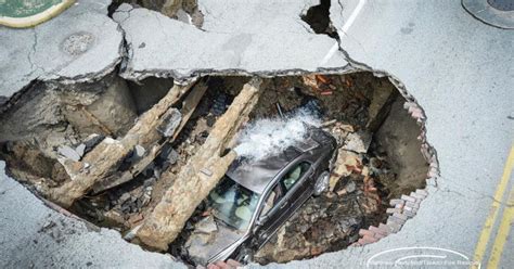 Toledo Sinkhole Watch Driver S Miracle Escape After Road Opens Up