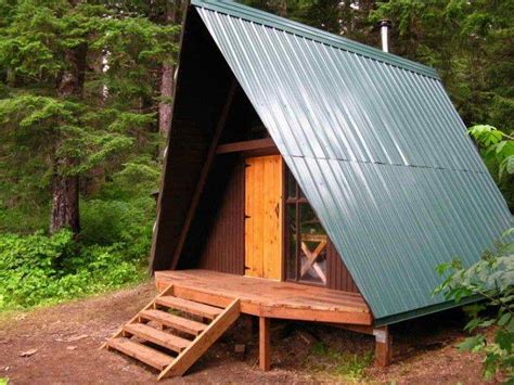 The layout inside showcases the great room, which flows into the kitchen. Frame Cabin Plans Kits Log Small Floor Loft House Cabins ...