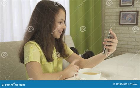 Teenage Girl Talks On Skype During Breakfast Stock Image Image Of Casual Happy 109434325