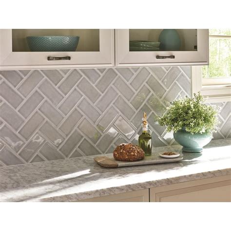 From a minimalist neutral backsplash that spans from ceiling to floor to the tiniest tile mosaic applied above a dainty cooktop, these important design elements provide many decorating and functional possibilities. Kitchen Innovations - Make a BIG Splash with Backsplash