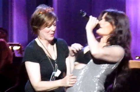 Let It Go Idina Menzels Boobs Pop Out On Stage She Handles It Like