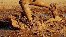 Running in Muddy Conditions: How to Do It like a Pro | RunnerClick