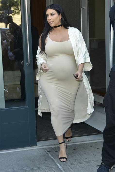 Pregnant Kim Kardashian Looks Blooming Marvellous In Cream Skintight
