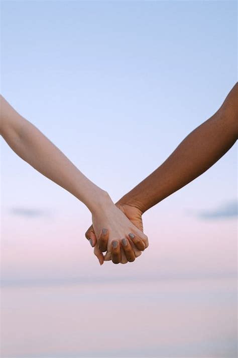 2 Person Holding Hands · Free Stock Photo