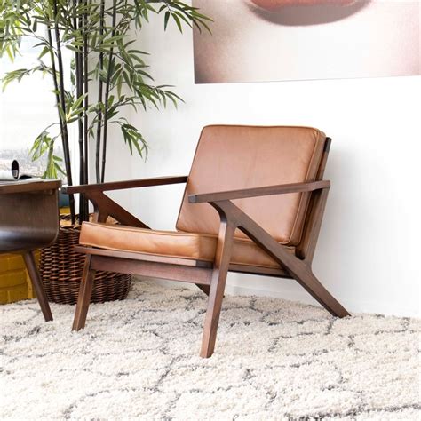 We recommend a good leather cleaner and conditioner to care for your top grain leather chair. mid century modern leon cognac tan leather accent chair ...