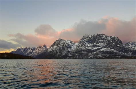 Expansive Fjord In The Lofoten Islands Surrounded With Snowy Mountains