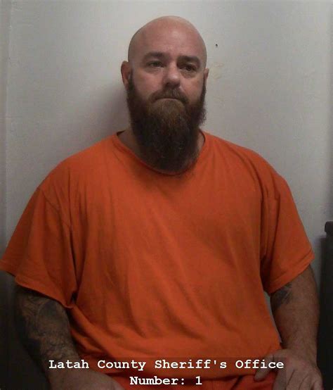 Bryan Kohberger wears protective helmet after landing in Idaho