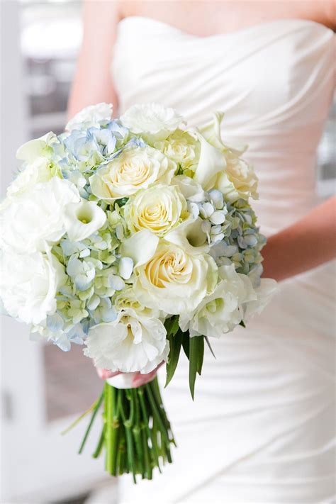 Light Blue Hydrangeas Pale Yellow Roses And White Lisianthus Bouquet