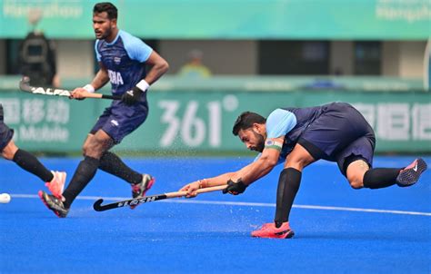 indian men s hockey staff conquer japan 5 1 to claim gold medal in hangzhou secures spot in