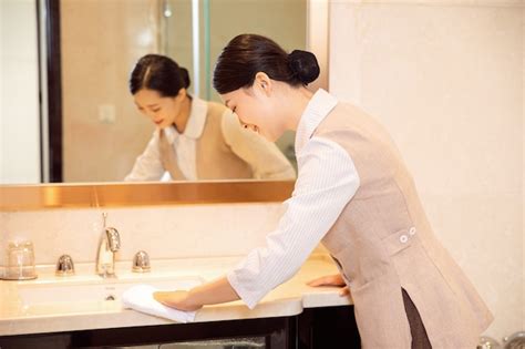 Premium Photo Young Hotel Maid Cleaning Hotel Rooms