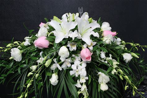 Beautiful Lily And Rose Casket Spray