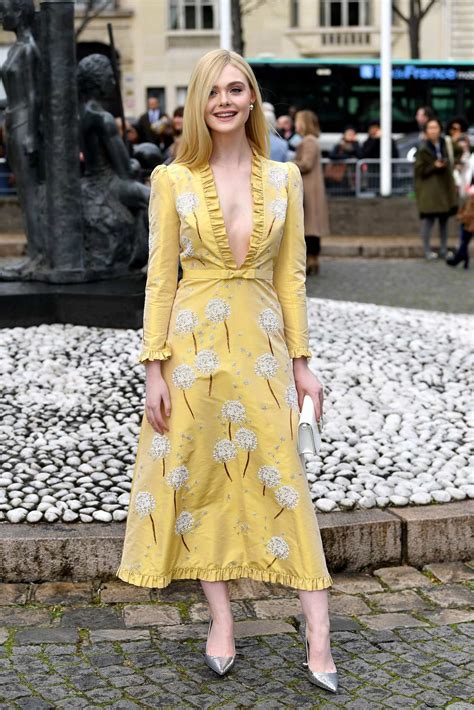 Elle Fanning Attends The Miu Miu Show During Paris Fashion Week